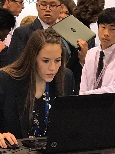 DECA Virtual Business Challenge competitors intently focused on the Virtual Business Accounting challenge